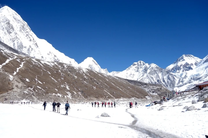 A group of people trekking to the everest base camp