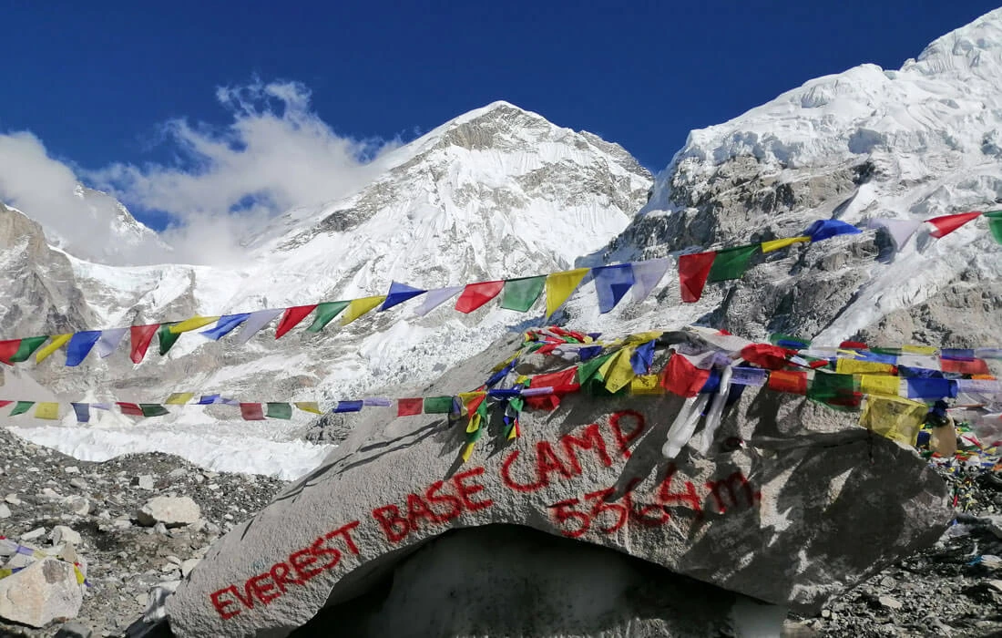 Everest Base Camp's Stone with mountain in the back