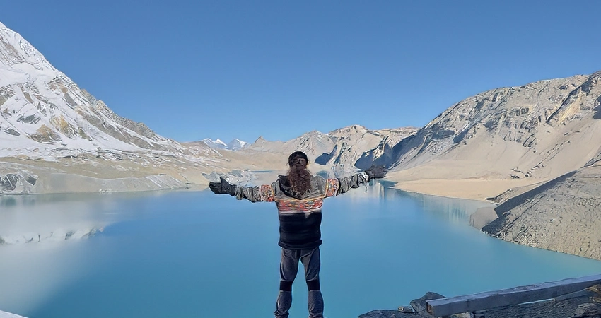 travelers enjoying tilicho lake view